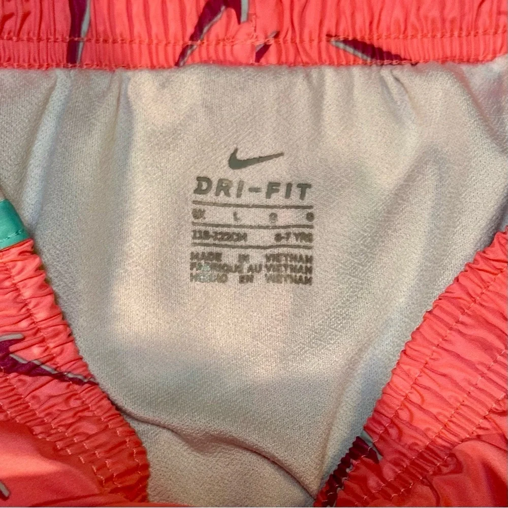 Girls Nike Coral and Teal Dri-FIT Shorts. Size L. (6-7)